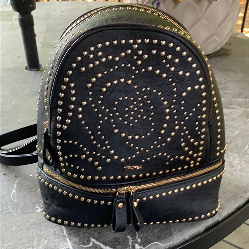 Black leatherBackpack with Gold Studded Design. Bought in Florence. Mint cond